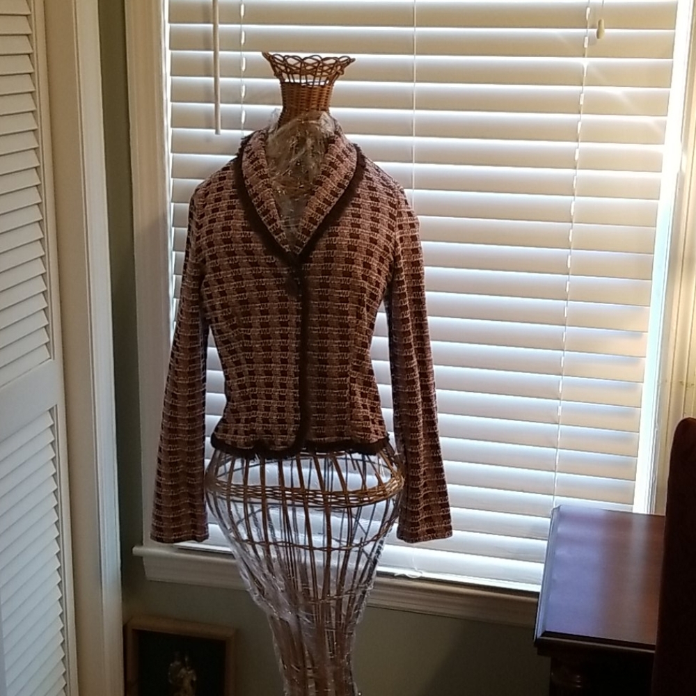 Large. Pink and brown short jacket.